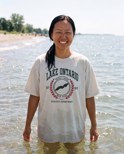 Athletic Dept Tee in Bone, worn on the shore of Lake Ontario