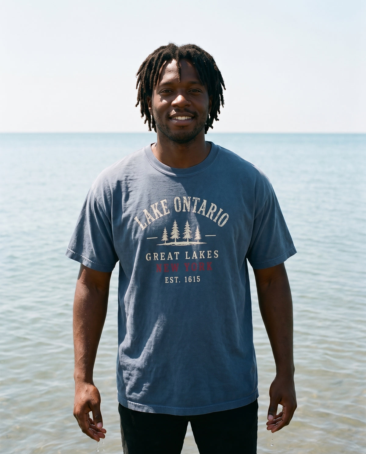 Lake Ontario Great Lakes tee in Indigo, knee-deep at Southwick Beach