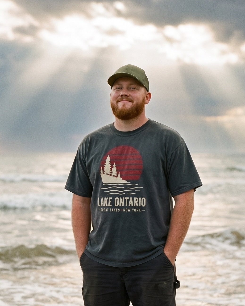Lake Ontario Sunset tee in Black, knee-deep off Fair Haven beach