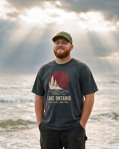 Lake Ontario Sunset tee in Black, knee-deep off Fair Haven beach